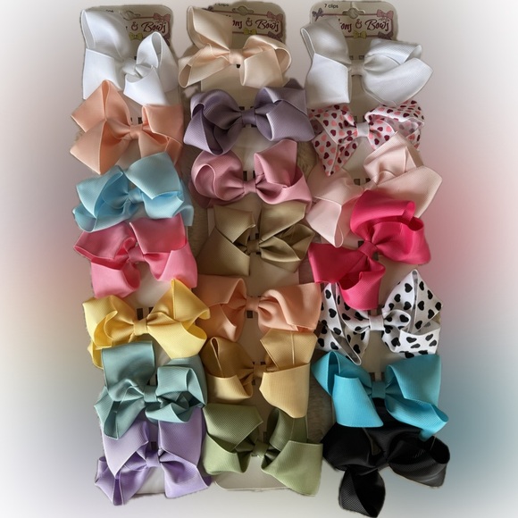 Other - Bow bundle with back clips. 3 panels of 7 each for total of 21 bows. NWT
